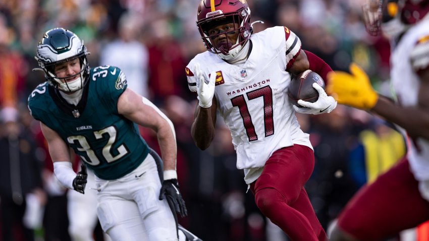 PHILADELPHIA, PENNSYLVANIA – JANUARY 26: Terry McLaurin #17 of the Washington Commanders runs the ball to score a touchdown in the second quarter of the game against the Philadelphia Eagles at Lincoln Financial Field on January 26, 2025 in Philadelphia, Pennsylvania. The Eagles beat the Commanders 55-23. (Photo by Lauren Leigh Bacho/Getty Images)