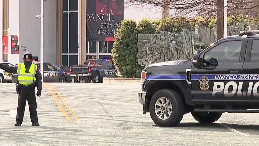 Police outside the Kennedy Center after a bomb threat against Shen Yun.
